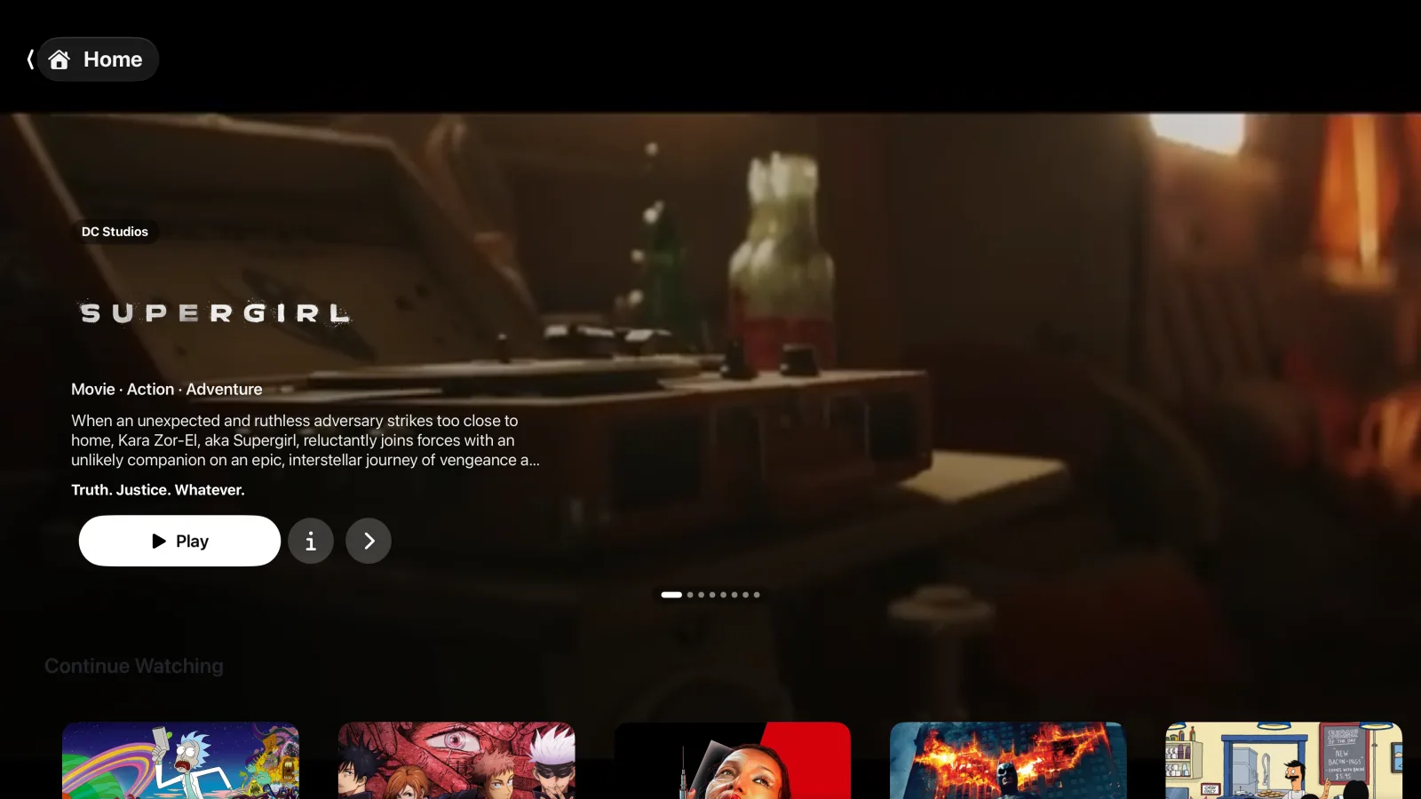 CleanSkin: a Supergirl hero fills the screen with the trailer breathing behind, poster row underneath.